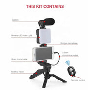 Smartphone vlogging kit with tripod, LED video light, shotgun microphone, phone holder, and remote control for live streaming and video recording.