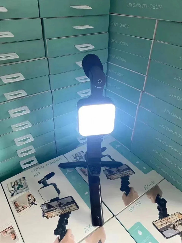 Smartphone vlogging kit with tripod, LED fill light, microphone, and phone holder for live streaming and video creation