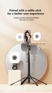 Mini LED smartphone selfie fill light with 3 adjustable brightness modes, portable clip-on design, shown paired with a selfie stick for enhanced video and beauty lighting.