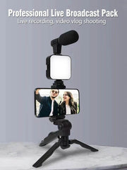 Smartphone vlogging kit with tripod, phone holder, LED fill light, and mini microphone for live streaming and video recording