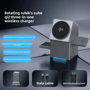 Gray multifunctional rotating rubik's cube style smart watch charger with wireless and magnetic fast charging capability and included data cable and charging head