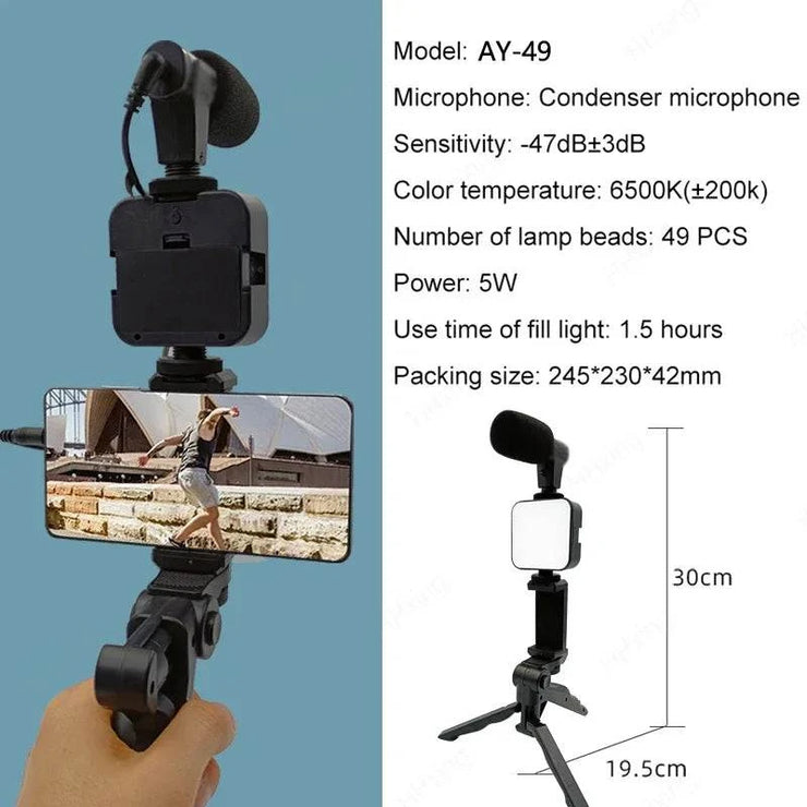 Smartphone vlogging kit with tripod, condenser microphone, LED fill light, and mobile phone holder for live streaming and video recording.